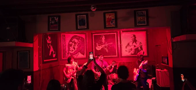 Crowd enjoying live music at PoorHouse Kava.